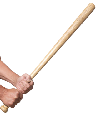 A man’s hand holds a bat